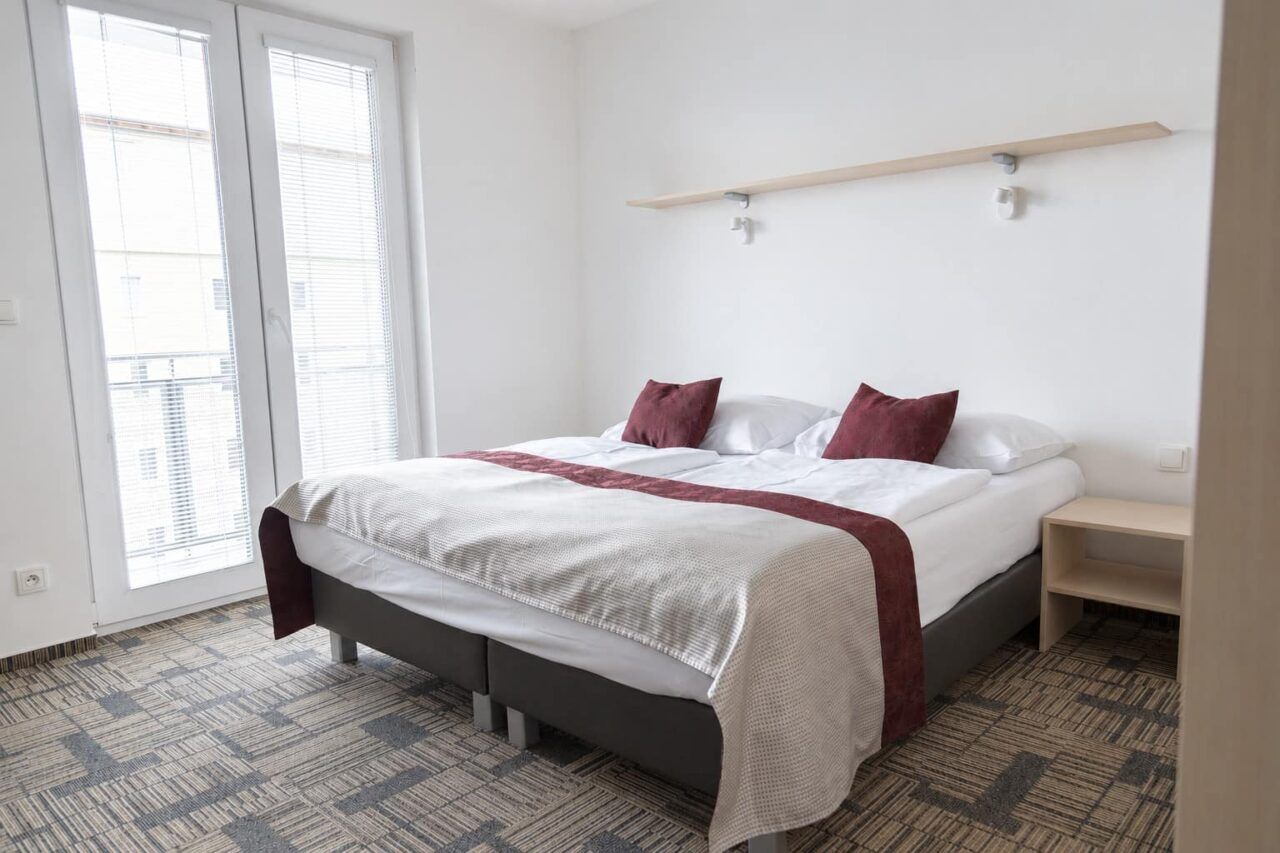 Schlafzimmer 2 — Apartment Deluxe mit 3 Schlafzimmern