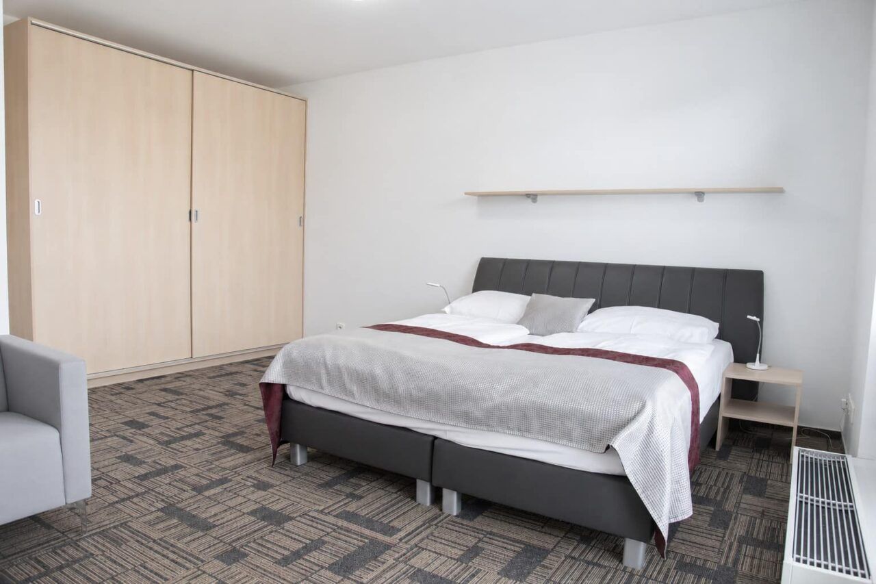 Schlafzimmer 4 — Apartment Deluxe mit 3 Schlafzimmern