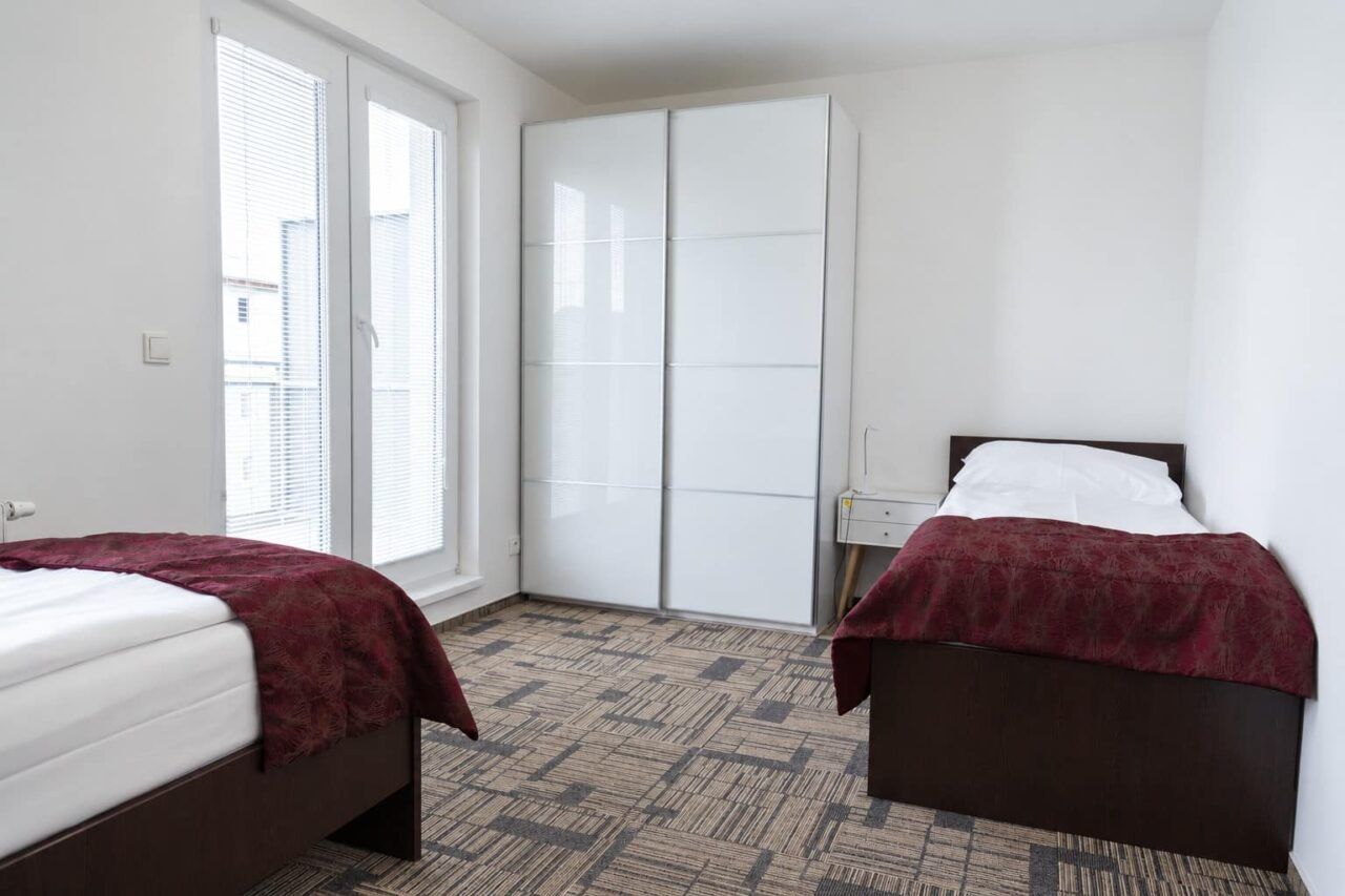 Schlafzimmer 6 — Apartment Deluxe mit 3 Schlafzimmern