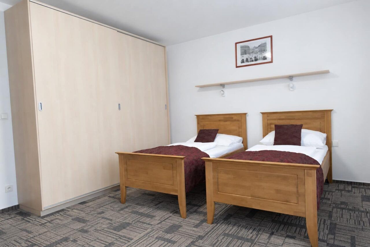 Schlafzimmer 8 — Apartment Deluxe mit 3 Schlafzimmern