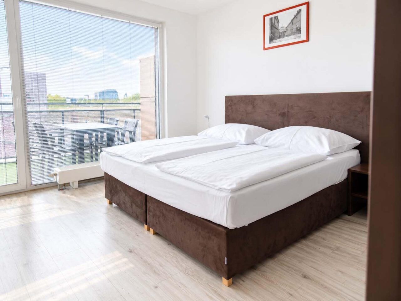 Schlafzimmer 1 — Zweigeschossiges Apartment Deluxe mit Terrasse