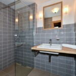 Koupelna v třílůžkovém studiu