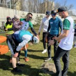 Kajakář Pavel Srbecký v cíli s ostatními členy týmu